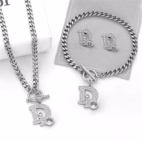 Gold Stainless Steel Butterfly Pendant Necklace and Earrings Bracelet Ring Four-Piece Set